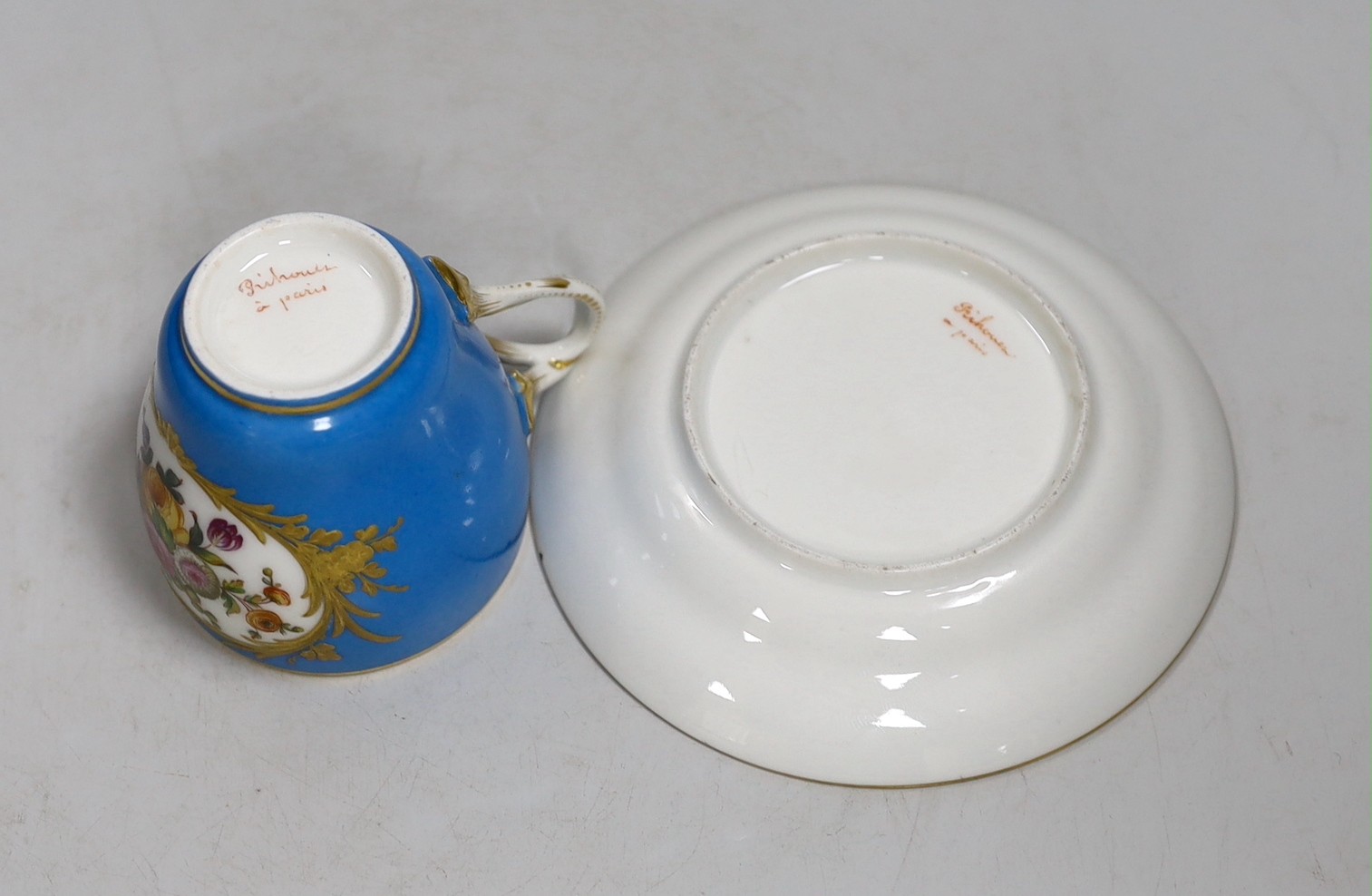 A Paris porcelain Sevres style cup and saucer